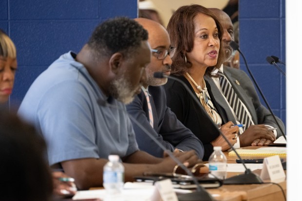 Gary Community School Corporation board member Danita Johnson-Woods welcomes newly-appointed superintendent Yvonne Stokes during a public meeting on Friday, June 7, 2024. (Kyle Telechan/for the Post-Tribune)