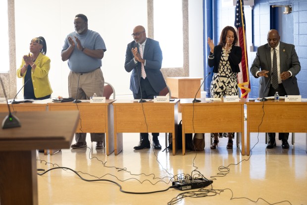 Gary Community School Corporation board members applaud newly-appointed superintendent Yvonne Stokes during a public meeting on Friday, June 7, 2024. (Kyle Telechan/for the Post-Tribune)