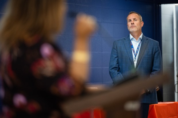 Gary Community School Corporation manager Mike Raisor looks on as newly-appointed Gary Community School Corporation superintendent Yvonne Stokes speaks during a public meet and greet at the Gary Area Career Center on Tuesday, June 11, 2024. (Kyle Telechan/for the Post-Tribune)