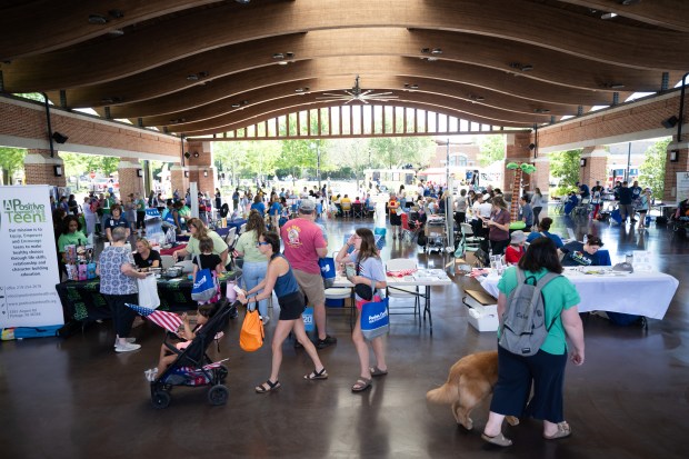 Visitors walk the floor during the Porter County Health Department's first annual Health and Wellness family Fair on Friday, June 14, 2024. (Kyle Telechan/for the Post-Tribune)