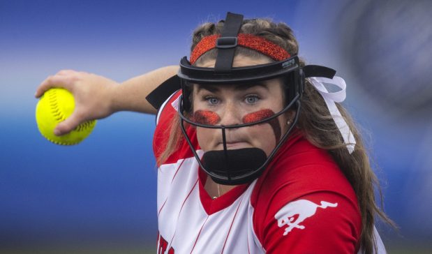 Munster's Emily Siurek pitches against Lake Central during the Class 4A Lake Central Sectional championship game in St. John on Friday, May 24, 2024. (Vincent D. Johnson/for the Post-Tribune)