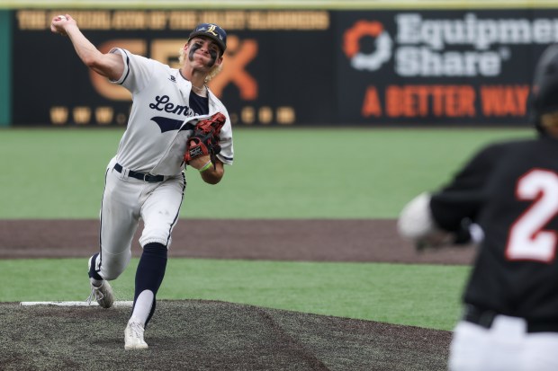 Lemont's Jacob Parr (19) throws a pitch during the Class 3A State Championship game against Crystal Lake in Joliet on Saturday, June 8, 2024. (Troy Stolt/for the Daily Southtown)