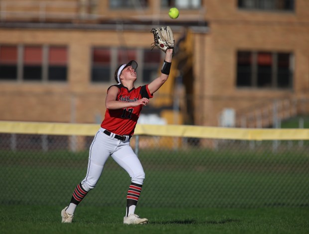 Marist outfielder Breanna Hanik (17) catches a fly ball during a game at Joliet Catholic Academy in Joliet on Monday, April 15, 2024. (Trent Sprague/for Chicago Tribune)