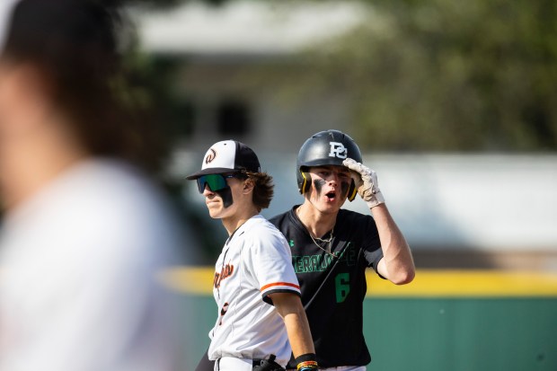 Providence's Nate O'Donnell gets excited after advancing to second against Lincoln-Way West during the Class 4A Providence Sectional final in New Lenox on Friday, May 31, 2024. (Vincent D. Johnson/for the Daily Southtown)