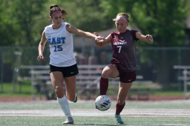 Lockport's Emma Czech (7) receives a pass during a game against Lincoln-Way East in Lockport on Saturday May 4, 2024. (Troy Stolt/for the Daily Southtown)