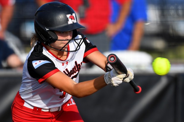 Marist's Jacklyn Pigatto (7) lays down a bunt. St. Charles North defeated Marist 7-2 in the Class 4A state championship at Louisville Slugger Sports Complex, Saturday, June 8, 2024(Rob Dicker / Daily Southtown)