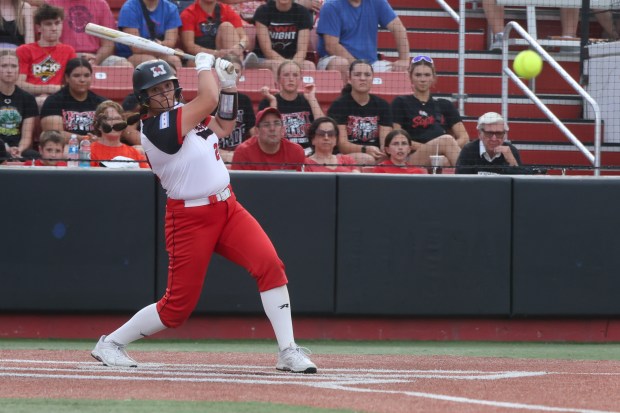 Marist's Gabriella Novickas (22) fouls a ball away during the Class 4A Rosemont Supersectional game against Lincoln-Way Central on Monday, June 3, 2024. (Troy Stolt/for the Daily Southtown)