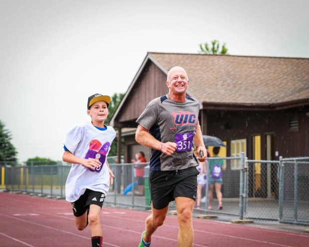 Peter Jansson, right, runs in the 2022 Miles for Maddog event supporting organ and tissue donation. The event pays tribute to donors who have passed away while celebrating lives saved through donation. (Maddog Strong Foundation)