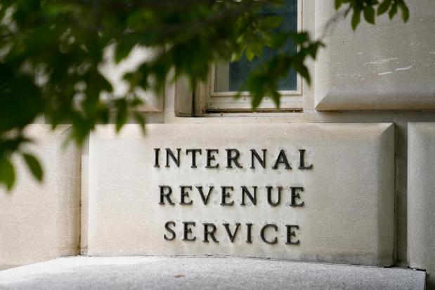 FILE - A sign outside the Internal Revenue Service building is seen, May 4, 2021, in Washington. The IRS said Friday, April 26, 2024, more than 140,000 taxpayers filed their taxes through its new direct file pilot program. It says the program's users claimed more than $90 million in refunds, saving roughly $5.6 million in fees they would have spent with commercial tax preparation companies. (AP Photo/Patrick Semansky, File)