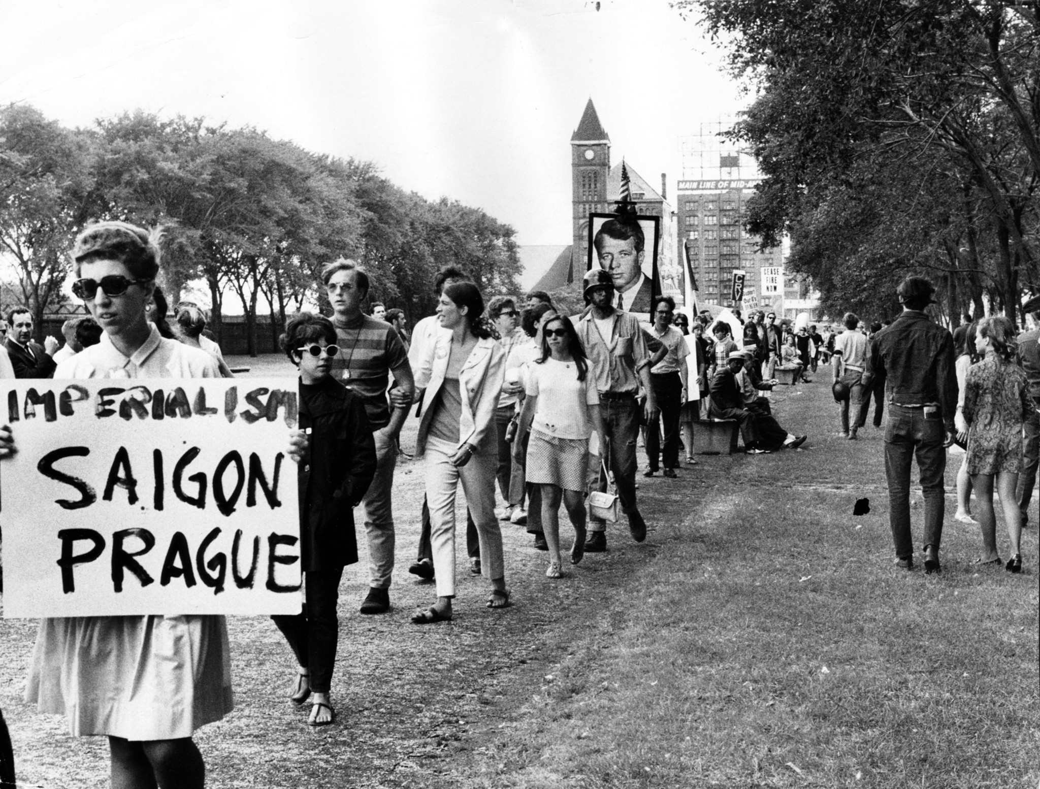 Anti-war protesters march outside the Hilton Hotel in downtown Chicago...