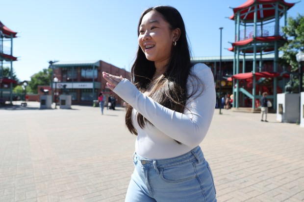 Keeley Chiu, 17, walks through Chinatown Square, May 30, 2024, in Chicago. A junior at Jones College Prep, Keeley has taken an interest in politics and government, and she volunteered for Ald. Nicole Lee's 2023 campaign. (John J. Kim/Chicago Tribune)