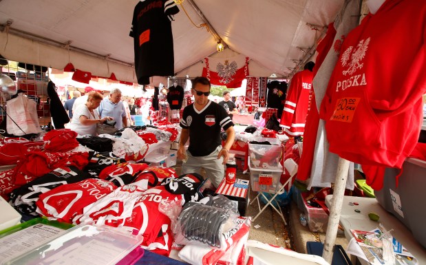 Alex Zajac sells items at his Sports Outlet Express tent during the Taste of Polonia in Chicago's Jefferson Park neighborhood on Sept. 7, 2015. (Phil Velasquez/Chicago Tribune)