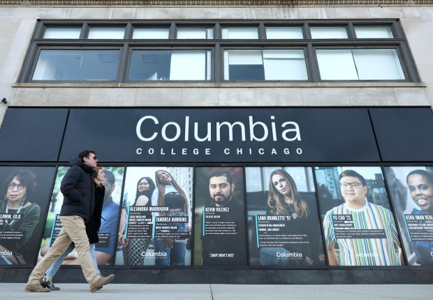 People walk past the Columbia College campus center building at 600 S. Michigan Ave. on Feb. 10, 2024, in Chicago. (John J. Kim/Chicago Tribune)