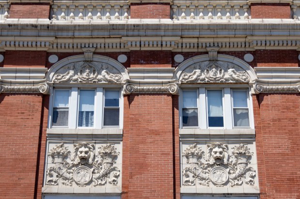 The Douglas Park Auditorium sports bas-relief lions and angels on the building along Ogden and Kedzie avenues in North Lawndale, June 11, 2024. (Brian Cassella/Chicago Tribune)
