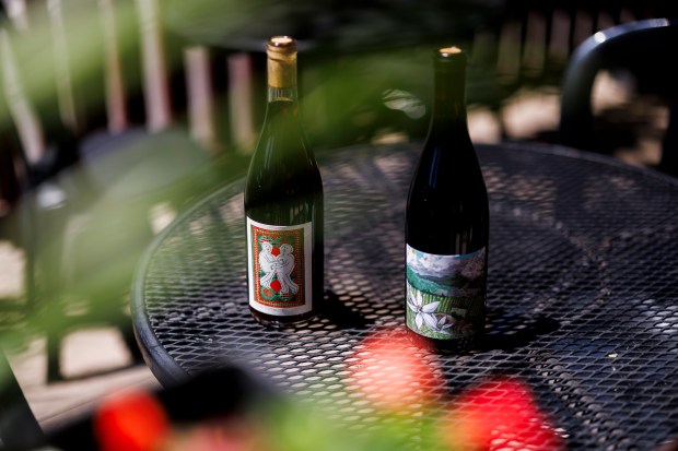 The Martha Stoumen 2022 Post Flirtation California Red, left, and the Kelley Fox 2022 Mirabai Dundee Hills Pinot Noir at the Printers Row Wine Bar and Shop in Chicago. (Armando L. Sanchez/Chicago Tribune)