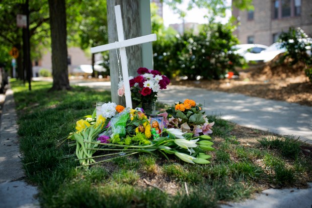 A memorial shown on June 10, 2022 sits near where 3-year-old Lily Grace Shambrook was killed in the 1100 block of West Leland Avenue in Uptown. The bicycle she was being carried on was forced to maneuver around a ComEd truck parked in the bike lane, and a semitruck collided with the bike, according to media reports. (E. Jason Wambsgans/Chicago Tribune)