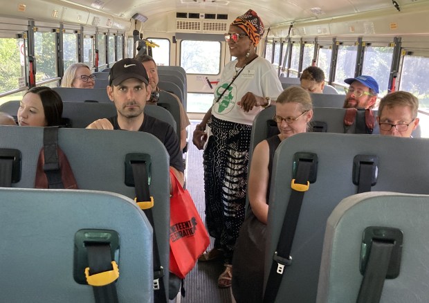 Participants on the Juneteenth Journey bus tour get ready to leave Wednesday. (Steve Sadin/For the Lake County News-Sun)