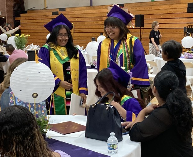 Families talk at a reception for the college and high school graduates from Waukegan to College. (Steve Sadin/For the Lake County News-Sun)