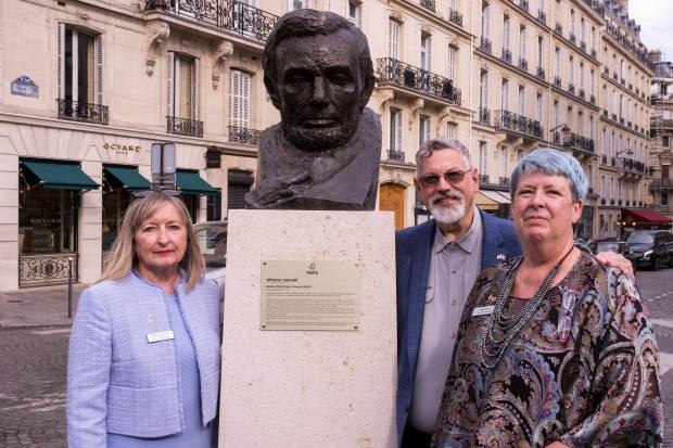 Maria Hrycelak, president of Park Ridge's Kalo Foundation, and John and Leigh Sasser of the foundation's board posed at the unveiling of late Park Ridge artist Alfonso Iannelli's bust of Abraham Lincoln in Paris. It will be on permanent public display near the Champs Elysee.