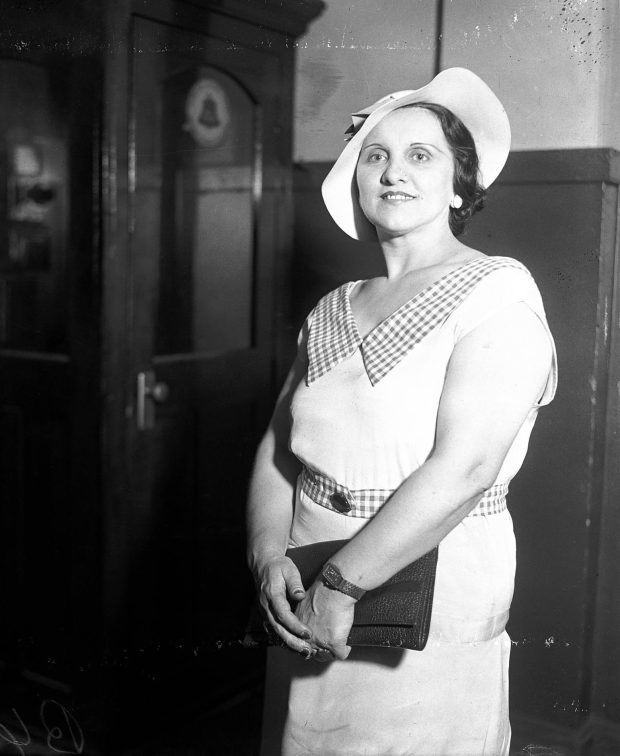 Anna Sage, nicknamed the "Woman in Red," at the Sheffield Avenue police station in July 1934. Sage had been with John Dillinger when he was shot and killed by FBI agents outside the Biograph Theater in Chicago on July 22, 1934. (Chicago Tribune historical photo)