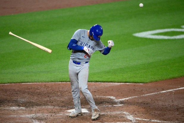 Cubs' Cody Bellinger reacts after he was hit by a pitch by Orioles relief pitcher Cionel Perez during the 7th inningon July 10, 2024, in Baltimore. (AP Photo/Nick Wass)