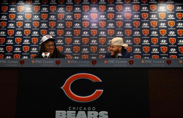 Chicago Bears linebackers Tremaine Edmunds, left, and T.J. Edwards, right, joke around with each other during a press conference at Halas Hall on July 19, 2024, in Lake Forest. (Stacey Wescott/Chicago Tribune)