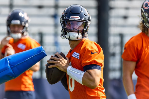 Bears quarterback Caleb Williams throws a pass during training camp at Halas Hall on July 20, 2024. (Tess Crowley/Chicago Tribune)