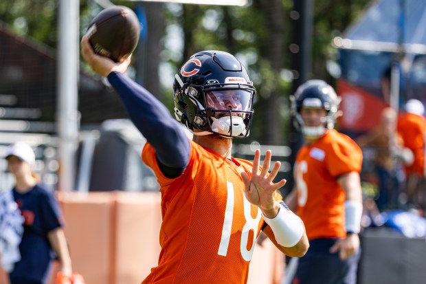 Bears quarterback Caleb Williams throws a pass during training camp at Halas Hall on July 20, 2024. (Tess Crowley/Chicago Tribune)