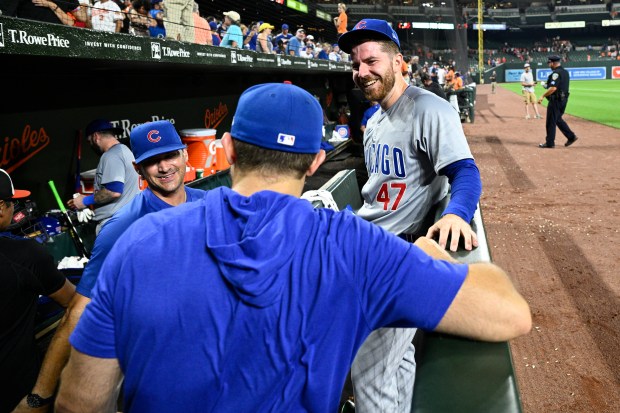 Chicago Cubs relief pitcher Hunter Bigge (47) reacts in the dugout after a baseball game against the Baltimore Orioles, Tuesday, July 9, 2024, in Baltimore. The Cubs won 9-2. (AP Photo/Nick Wass)