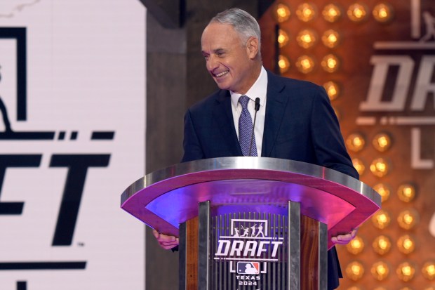 Commissioner Rob Manfred makes comments during the MLB draft in Fort Worth, Texas, on Sunday, July 14, 2024. (AP Photo/LM Otero)