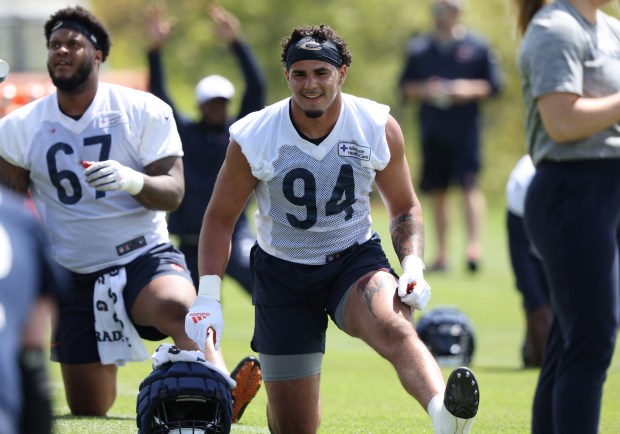 Defensive lineman Austin Booker (94) stretches during Bears rookie minicamp at Halas Hall Saturday, May 11, 2024, in Lake Forest. (John J. Kim/Chicago Tribune)