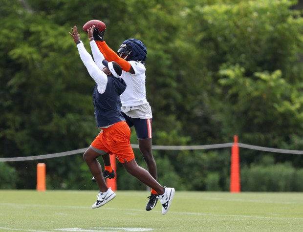 Chicago Bears cornerback Jaylon Johnson (1) catches a ball during training camp at Halas Hall on July 22, 2024, in Lake Forest. (Stacey Wescott/Chicago Tribune)