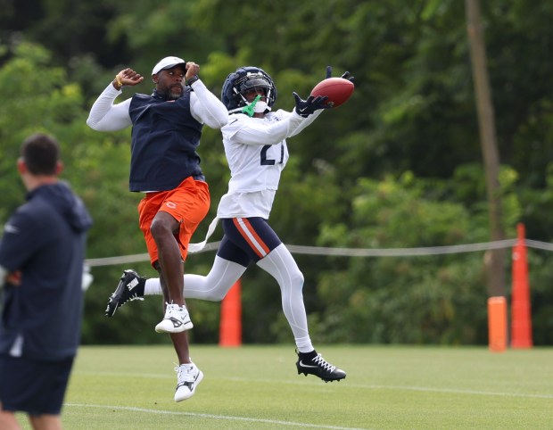 Chicago Bears cornerback Jaylon Jones (21) catches a ball during training camp at Halas Hall on July 22, 2024, in Lake Forest. (Stacey Wescott/Chicago Tribune)