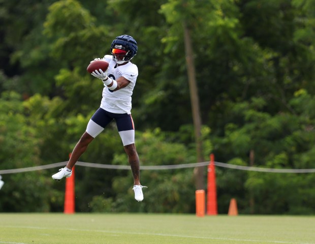 Chicago Bears cornerback Kyler Gordon (6) catches a ball during training camp at Halas Hall on July 22, 2024, in Lake Forest. (Stacey Wescott/Chicago Tribune)