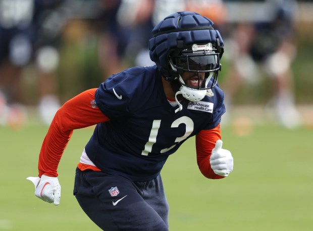 Bears wide receiver Keenan Allen (13) runs through drills during training camp at Halas Hall on July 22, 2024, in Lake Forest. (Stacey Wescott/Chicago Tribune)