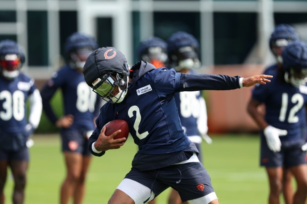 Bears wide receiver DJ Moore (2) catches a pass during training camp at Halas Hall on July 22, 2024, in Lake Forest. (Stacey Wescott/Chicago Tribune)