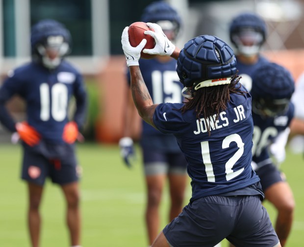 Bears wide receiver Velus Jones Jr. (12) catches a pass during training camp at Halas Hall on July 22, 2024, in Lake Forest. (Stacey Wescott/Chicago Tribune)