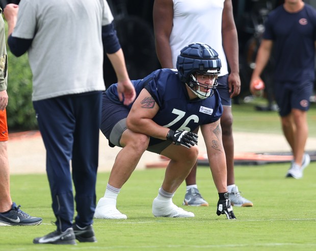 Bears guard Teven Jenkins (76) sets up for drills during training camp at Halas Hall on July 22, 2024, in Lake Forest. (Stacey Wescott/Chicago Tribune)