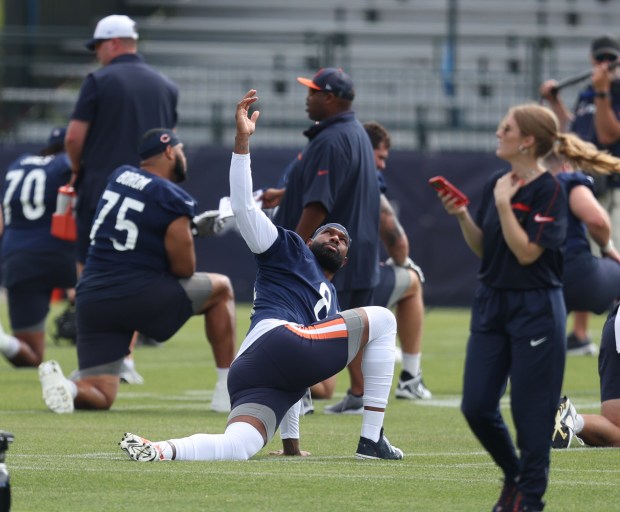 Bears tight end Marcedes Lewis (84) stretches out during training camp at Halas Hall on July 22, 2024, in Lake Forest. (Stacey Wescott/Chicago Tribune)