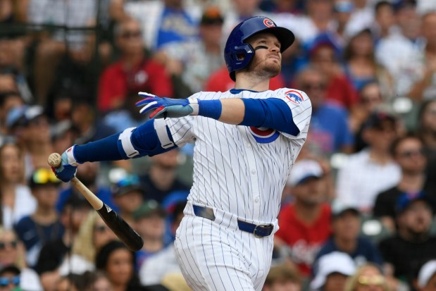 The Cubs' Ian Happ watches his three-run home run during the fifth inning against the Phillies on Thursday, July 4, 2024, at Wrigley Field. (AP Photo/Paul Beaty)