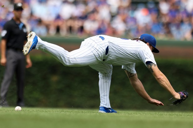 Cubs pitcher Justin Steele mishandles the ball in the first inning against the Brewers on July 24, 2024, at Wrigley Field. (Eileen T. Meslar/Chicago Tribune)