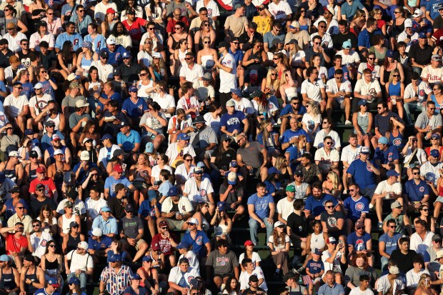 Fans in the right-field bleachers watch the third inning between the Cubs and Phillies on July 3, 2024, at Wrigley Field. (John J. Kim/Chicago Tribune)