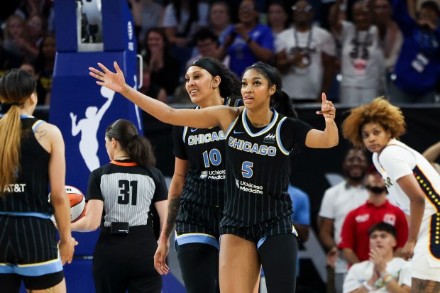 Sky forward Angel Reese (5) and center Kamilla Cardoso (10) celebrate a foul on the Fever on June 23, 2024, at Wintrust Arena. (Eileen T. Meslar/Chicago Tribune)