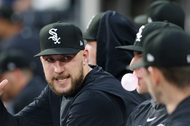 White Sox pitcher Garrett Crochet, left, talks with fellow pitchers in the first inning against the Rockies on June 28, 2024, at Guaranteed Rate Field. (John J. Kim/Chicago Tribune)