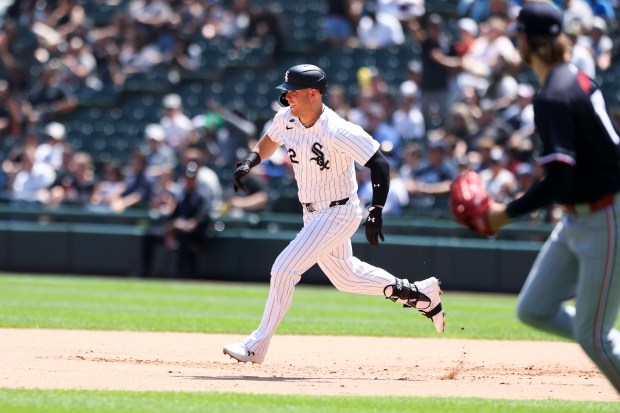 Chicago White Sox outfielder Gavin Sheets (32) runs to second base after hitting a double during the fifth inning against the Minnesota Twins at Guaranteed Rate Field on July 10, 2024. (Eileen T. Meslar/Chicago Tribune)