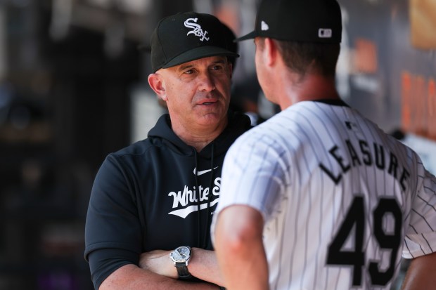 Chicago White Sox manager Pedro Grifol speaks to pitcher Jordan Leasure (49) during the seventh inning against the Minnesota Twins at Guaranteed Rate Field on July 10, 2024. (Eileen T. Meslar/Chicago Tribune)