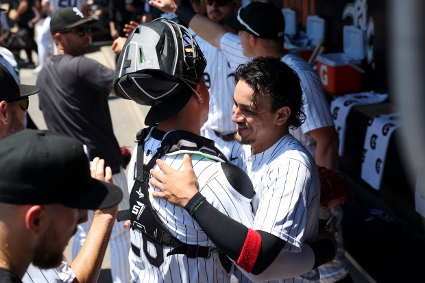 Chicago White Sox second base Nicky Lopez (8) hugs catcher Korey Lee (26) before the game against the Minnesota Twins at Guaranteed Rate Field on July 10, 2024. (Eileen T. Meslar/Chicago Tribune)