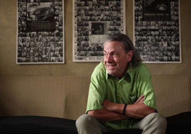 Artist, poet, and musician J.J. Tindall in his home on July 9, 2024, in Oak Park. Tindall is a multimedia artist who has been creating art in Illinois for several decades. (Stacey Wescott/Chicago Tribune)