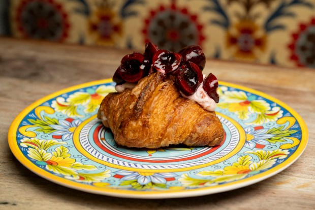 A seasonal cherry croissant on July 13, 2024, at Pan Artesanal Bakery in Chicago. (Vincent Alban/for the Chicago Tribune)