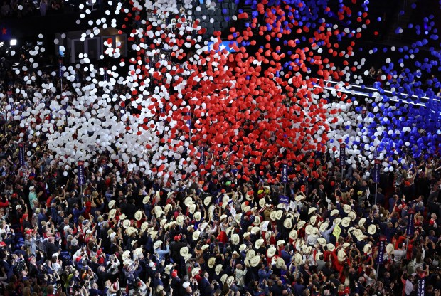 Balloons fall onto delegates after presidential candidate Donald Trump's speech during Thursday's Republican National Convention session on July 18, 2024, in Milwaukee. (John J. Kim/Chicago Tribune)